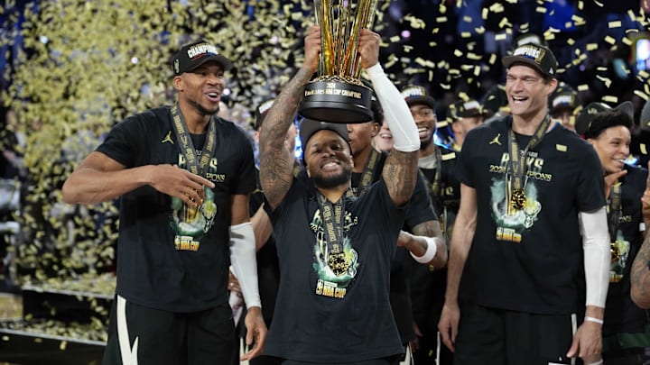 Dec 17, 2024; Las Vegas, Nevada, USA; Milwaukee Bucks forward Giannis Antetokounmpo (34), guard Damian Lillard (0) and center Brook Lopez (11) celebrate after winning the Emirates NBA Cup championship game against the Oklahoma City Thunder at T-Mobile Arena. Mandatory Credit: Kyle Terada-Imagn Images