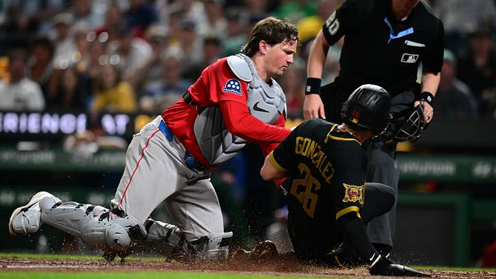 Aug 14, 2026; Pittsburgh, Pennsylvania, USA; Boston Red Sox catcher Adley Rutschman (31) tags out Pittsburgh Pirates short stop Jacob Gonzalez (26) at home plate during the eighth inning at PNC Park. Mandatory Credit: David Dermer-Imagn Images Aug 14, 2026; Pittsburgh, Pennsylvania, USA; Boston Red Sox catcher Adley Rutschman (31) tags out Pittsburgh Pirates short stop Jacob Gonzalez (26) at home plate during the eighth inning at PNC Park. Mandatory Credit: David Dermer-Imagn Images