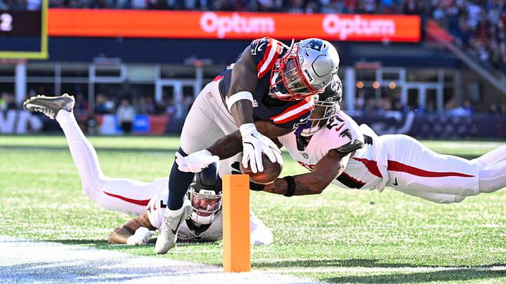 Nov 2, 2025; Foxborough, Massachusetts, USA;  New England Patriots wide receiver Stefon Diggs (8) runs for a touchdown against Atlanta Falcons safety Jessie Bates III (3) and cornerback Mike Hughes (21) during the first half at Gillette Stadium. Mandatory Credit: Eric Canha-Imagn Images
