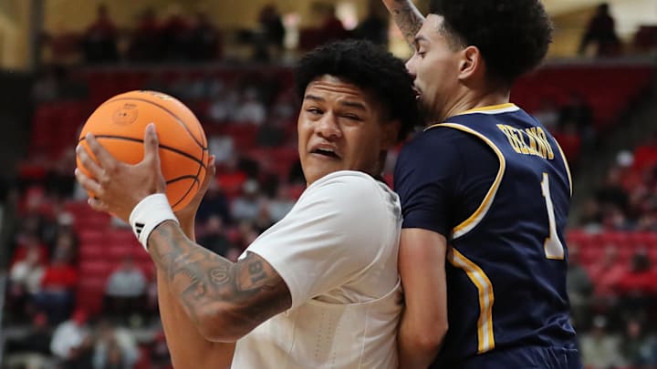 Texas Tech Red Raiders forward LeJuan Watts (3) looks for an opening against Northern Colorado Bears guard Vince Delano (1) in the first half at United Supermarkets Arena. Texas Tech Red Raiders forward LeJuan Watts (3) looks for an opening against Northern Colorado Bears guard Vince Delano (1) in the first half at United Supermarkets Arena.