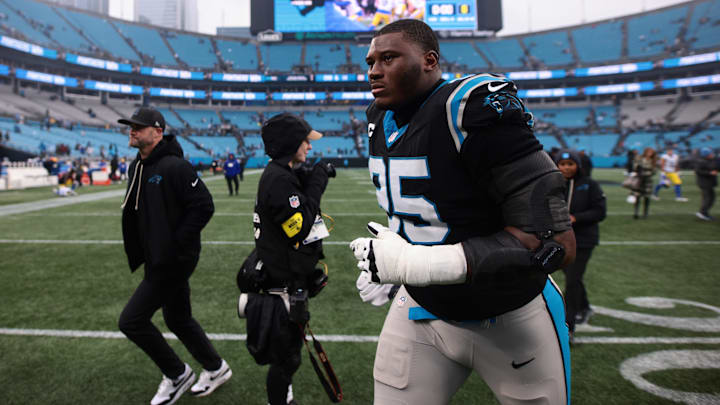 Nov 30, 2025; Charlotte, North Carolina, USA; Carolina Panthers defensive end Derrick Brown (95) looks on after the game against the Los Angeles Rams at Bank of America Stadium. Mandatory Credit: Scott Kinser-Imagn Images