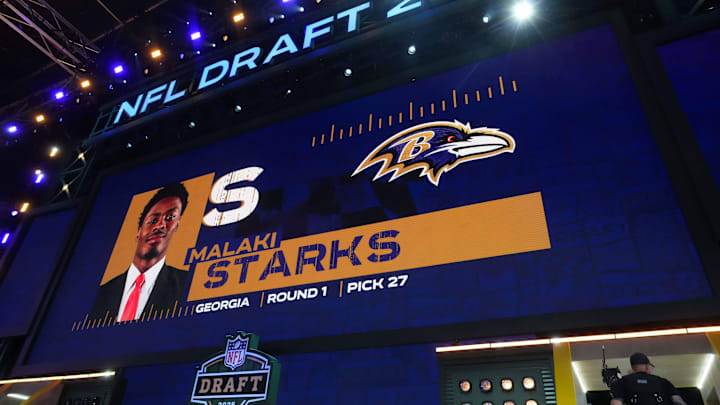 Apr 24, 2025; Green Bay, WI, USA; Georgia Bulldogs safety Malaki Starks is selected as the No. 27 pick by the Baltimore Ravens during the NFL Draft at Lambeau Field. Mandatory Credit: Kirby Lee-Imagn Images Apr 24, 2025; Green Bay, WI, USA; Georgia Bulldogs safety Malaki Starks is selected as the No. 27 pick by the Baltimore Ravens during the NFL Draft at Lambeau Field. Mandatory Credit: Kirby Lee-Imagn Images