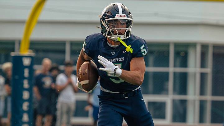 Nate Ellis takes the ball down the field