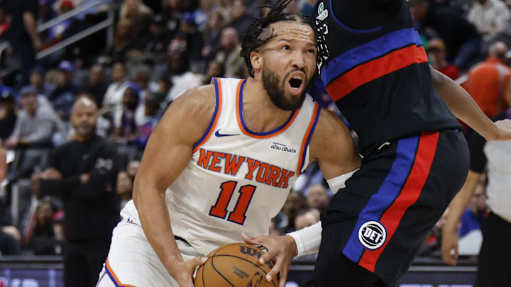 Feb 6, 2026; Detroit, Michigan, USA;  New York Knicks guard Jalen Brunson (11) dribbles on Detroit Pistons guard Ausar Thompson (9) in the first half at Little Caesars Arena. Mandatory Credit: Rick Osentoski-Imagn Images