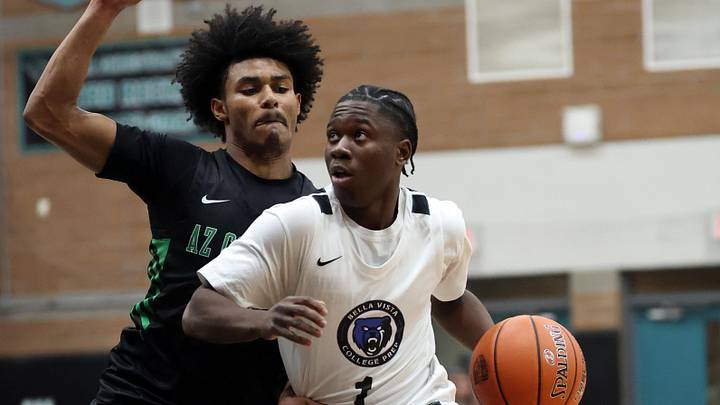 Jan 3, 2025; Gilbert, AZ, USA; CIA Bella Vista (AZ) guard Miles Sadler (1) drives to the basket against Arizona Compass Prep guard Kalek House (5) during the Hoophall West High School Invitational at Highland High School. Mandatory Credit: Mark J. Rebilas-Imagn Images