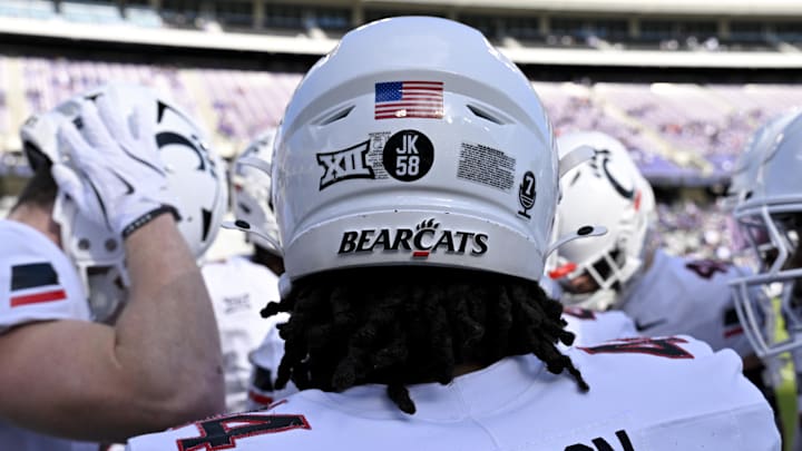 Nov 29, 2025; Fort Worth, Texas, USA; A view of the JK 58 decal on the back of the helmet of Cincinnati Bearcats defensive end Mikah Coleman (4) before the game at Amon G. Carter Stadium. Mandatory Credit: Jerome Miron-Imagn Images Nov 29, 2025; Fort Worth, Texas, USA; A view of the JK 58 decal on the back of the helmet of Cincinnati Bearcats defensive end Mikah Coleman (4) before the game at Amon G. Carter Stadium. Mandatory Credit: Jerome Miron-Imagn Images