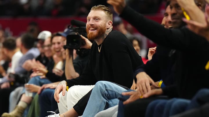 Jan 16, 2024; Los Angeles, California, USA; Las Vegas Raiders defensive end Maxx Crosby reacts in the second half of the game between the LA Clippers and the Oklahoma City Thunder at Crypto.com Arena. Mandatory Credit: Kirby Lee-USA TODAY Sports Jan 16, 2024; Los Angeles, California, USA; Las Vegas Raiders defensive end Maxx Crosby reacts in the second half of the game between the LA Clippers and the Oklahoma City Thunder at Crypto.com Arena. Mandatory Credit: Kirby Lee-USA TODAY Sports