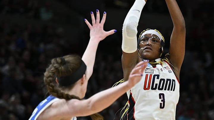 Mar 30, 2024; Portland, OR, USA; UConn Huskies forward Aaliyah Edwards (3) shoots a jump shot during the first half against Duke Blue Devils center Kennedy Brown (42) in the semifinals of the Portland Regional of the 2024 NCAA Tournament at the Moda Center. Mandatory Credit: Troy Wayrynen-Imagn Images