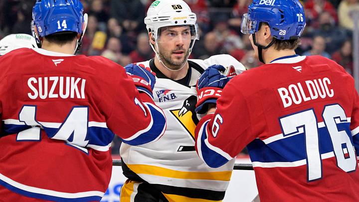 Dec 20, 2025; Montreal, Quebec, CAN; Pittsburgh Penguins defenseman Kris Letang (58) holds back Montreal Canadiens forward Nick Suzuki (14) and teammate forward Zack Bolduc (76) during the second period at the Bell Centre. Mandatory Credit: Eric Bolte-Imagn Images Dec 20, 2025; Montreal, Quebec, CAN; Pittsburgh Penguins defenseman Kris Letang (58) holds back Montreal Canadiens forward Nick Suzuki (14) and teammate forward Zack Bolduc (76) during the second period at the Bell Centre. Mandatory Credit: Eric Bolte-Imagn Images