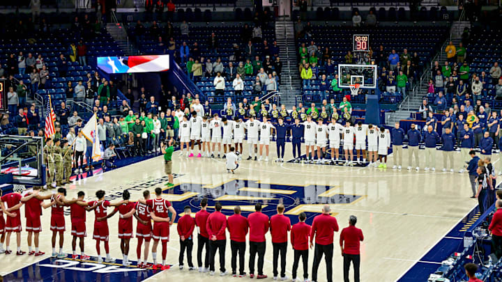 Mar 5, 2025; South Bend, Indiana, USA; The Notre Dame Fighting Irish and the Stanford Cardinal stand for the national anthem at the Purcell Pavilion. Mandatory Credit: Matt Cashore-Imagn Images Mar 5, 2025; South Bend, Indiana, USA; The Notre Dame Fighting Irish and the Stanford Cardinal stand for the national anthem at the Purcell Pavilion. Mandatory Credit: Matt Cashore-Imagn Images