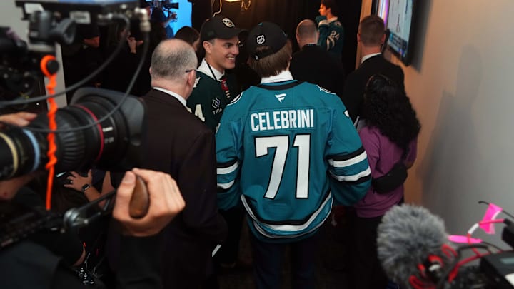 Jun 28, 2024; Las Vegas, Nevada, USA; San Jose Sharks 1st overall pick Macklin Celebrini talks with Minnesota Wild 1st round pick Zeev Buium in the first round of the 2024 NHL Draft at The Sphere. Mandatory Credit: Joe Camporeale-USA TODAY Sports