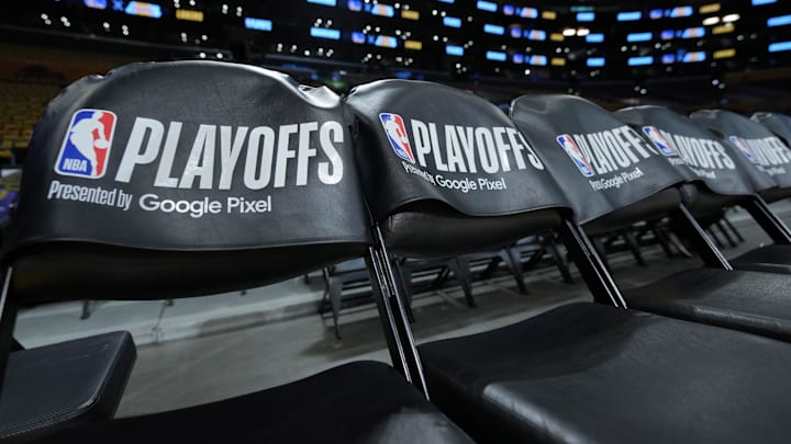 May 8, 2023; Los Angeles, California, USA; The NBA Playoffs presented by Google Pixel logo on the seat cushions of the Los Angeles Lakers bench during game four of the 2023 NBA playoffs at Crypto.com Arena. Mandatory Credit: Kirby Lee-Imagn Images