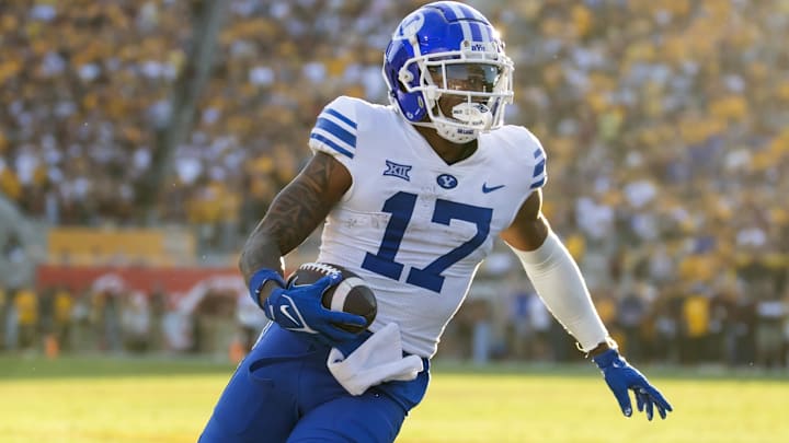 Nov 23, 2024; Tempe, Arizona, USA; Brigham Young Cougars wide receiver Keelan Marion (17) scores a touchdown against the Arizona State Sun Devils at Mountain America Stadium. Mandatory Credit: Mark J. Rebilas-Imagn Images