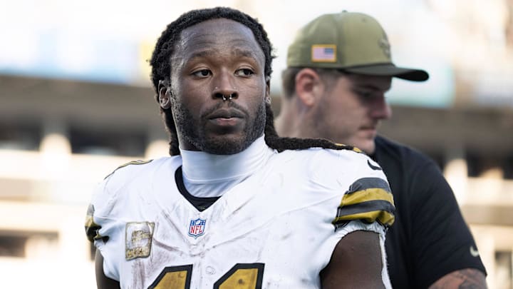 New Orleans Saints running back Alvin Kamara (41) walks off the field after the game at Bank of America Stadium. Mandatory Credit: Bob Donnan-Imagn Images