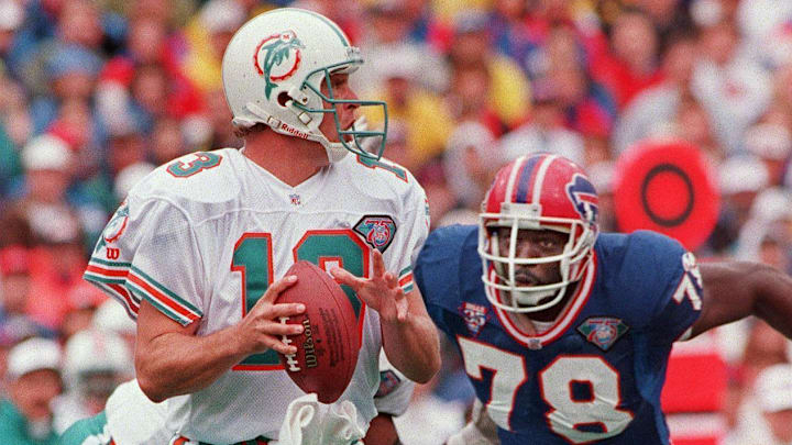 Bills DE Bruce Smith rushes Miami quarterback Dan Marino on Oct. 9, 1994. Bills DE Bruce Smith rushes Miami quarterback Dan Marino on Oct. 9, 1994.