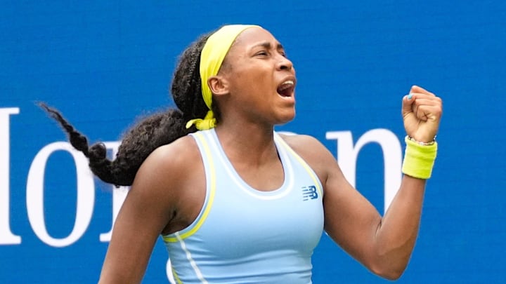Coco Gauff reacts after winning a set.