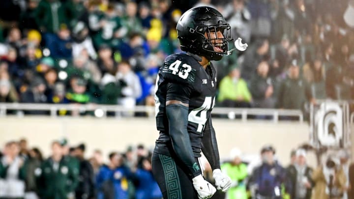 Michigan State's Malik Spencer celebrates after a play against Michigan during the first quarter on Saturday, Oct. 21, 2023, at Spartan Stadium in East Lansing.