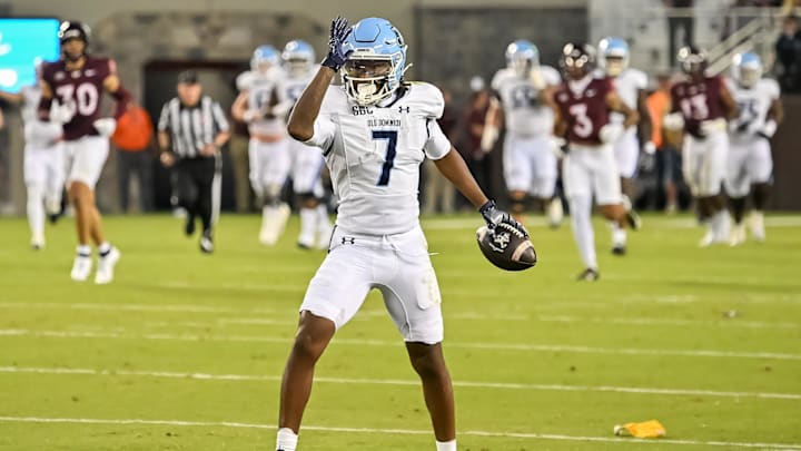 Sep 13, 2025; Blacksburg, Virginia, USA;  Old Dominion Monarchs wide receiver Na'eem Abdul-Rahim Gladding (7) celebrates a first down during the second quarter at Lane Stadium. Mandatory Credit: Brian Bishop-Imagn Images