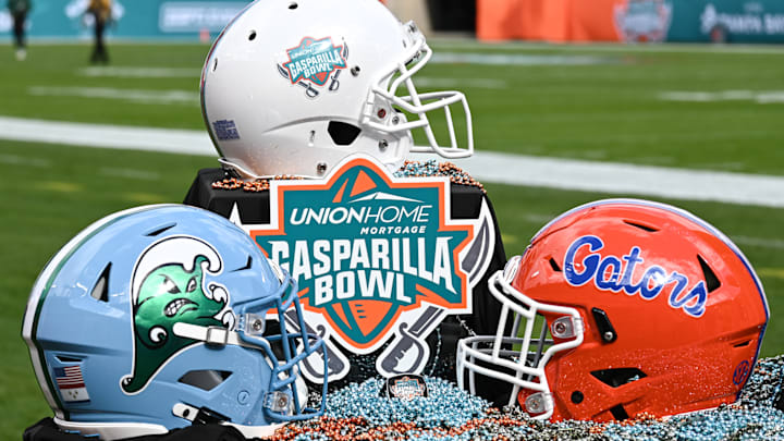 Helmets for the Florida Gators and Tulane Green Wave ahead of the 2024 Union Home Mortgage Gasparilla Bowl.