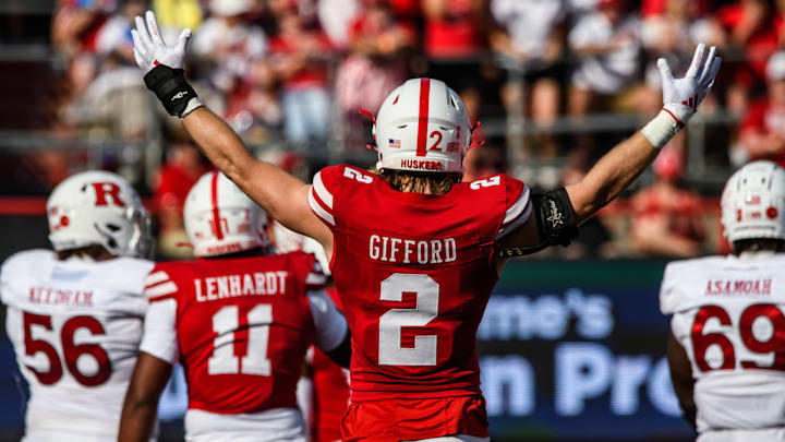 Nebraska defensive back Isaac Gifford (2) celebrates Ty Robinson's sack against Rutgers.
