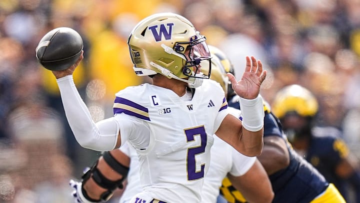 Washington quarterback Demond Williams Jr. (2) makes a pass against Michigan during the first half at Michigan Stadium in Ann Arbor on Saturday, Oct. 18, 2025. Washington quarterback Demond Williams Jr. (2) makes a pass against Michigan during the first half at Michigan Stadium in Ann Arbor on Saturday, Oct. 18, 2025.