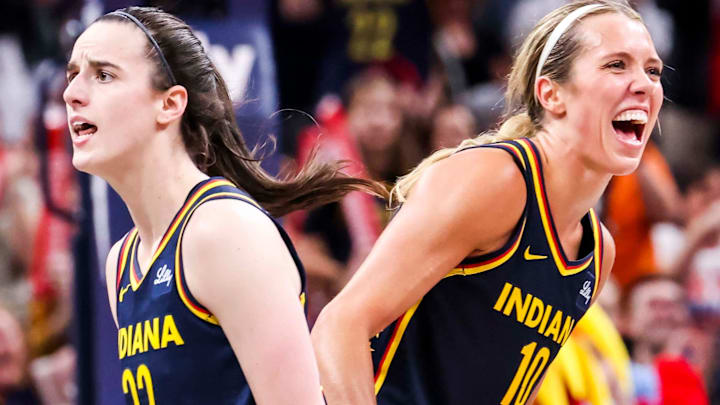 Indiana Fever guard Caitlin Clark (22) and Indiana Fever guard Lexie Hull (10) celebrate Saturday, June 14, 2025, during a game between the Indiana Fever and the New York Liberty at Gainbridge Fieldhouse in Indianapolis. The Indiana Fever defeated the New York Liberty, 102-88.