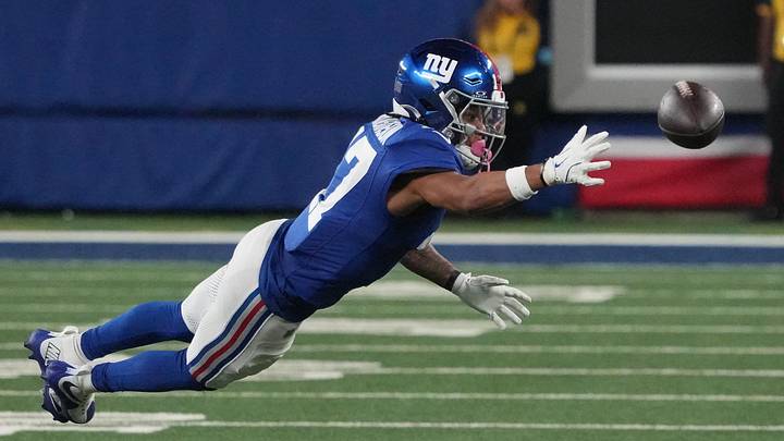 Oct 13, 2024; East Rutherford, New Jersey, USA;  New York Giants wide receiver Wan'Dale Robinson (17) can't hang on to a pass against the Cincinnati Bengals during the first half at MetLife Stadium. Mandatory Credit: Robert Deutsch-Imagn Images