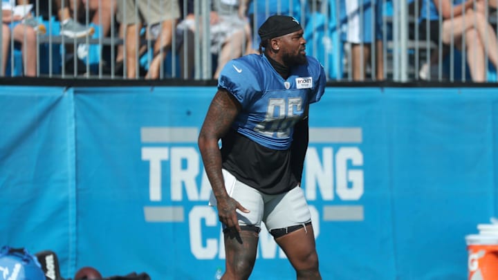 Lions defensive end Isaiah Buggs stretches during the Lions' joint practice with the Jaguars on Wednesday, Aug. 16, 2023, in Allen Park.