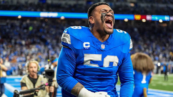 Detroit Lions offensive tackle Penei Sewell (58) yells out after warming up before the game against the Washington Commanders at Ford Field in Detroit, Saturday, Jan. 18, 2025.