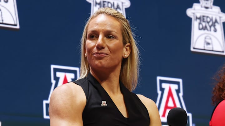 Oct 21, 2025; Kansas City, MO, USA; Arizona head coach Becky Burke speaks to media during Big 12 Womenís Basketball Media Day at T-Mobile Center. Mandatory Credit: Sophia Scheller-Imagn Images