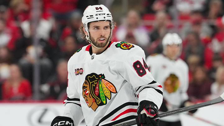 Jan 22, 2026; Raleigh, North Carolina, USA;  Chicago Blackhawks left wing Landon Slaggert (84) watches the play against the Carolina Hurricanes during the second period at Lenovo Center. Mandatory Credit: James Guillory-Imagn Images