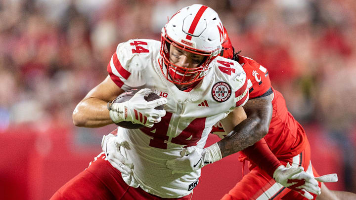 Nebraska tight end Luke Lindenmeyer gains yards against Cincinnati. Nebraska tight end Luke Lindenmeyer gains yards against Cincinnati.