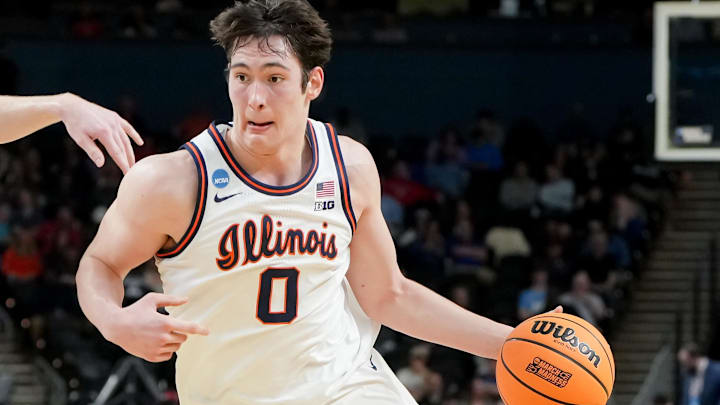 Mar 19, 2026; Greenville, SC, USA; Illinois Fighting Illini forward David Mirkovic (0) dribbles the ball against the Penn Quakers in the first half of a first round game of the men's 2026 NCAA Tournament at Bon Secours Wellness Arena. Mandatory Credit: Bob Donnan-Imagn Images