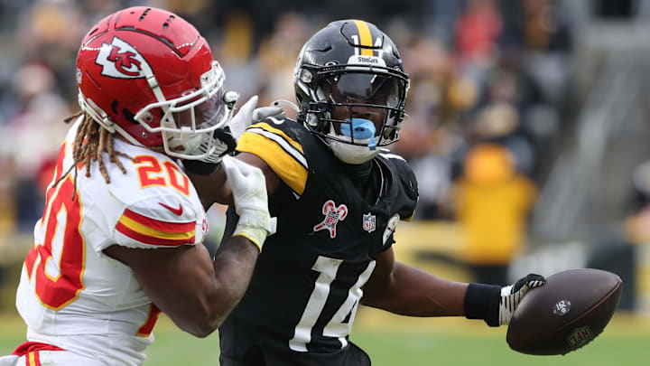 Pittsburgh Steelers wide receiver George Pickens runs after a catch as Kansas City Chiefs safety Justin Reid. Pittsburgh Steelers wide receiver George Pickens runs after a catch as Kansas City Chiefs safety Justin Reid.