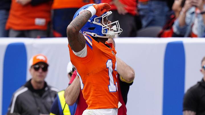 Oct 26, 2025; Denver, Colorado, USA;  Denver Broncos wide receiver Pat Bryant (13) celebrates scoring a touchdown in the second quarter against the Dallas Cowboys at Empower Field at Mile High. Mandatory Credit: Ron Chenoy-Imagn Images