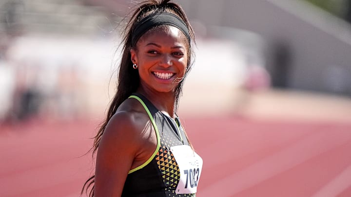 Team USA Red athlete Gabby Thomas (7083) walks the track ahead of the 1600 meter relay invitational at the Clyde Littlefield Texas Relays. Team USA Red athlete Gabby Thomas (7083) walks the track ahead of the 1600 meter relay invitational at the Clyde Littlefield Texas Relays.