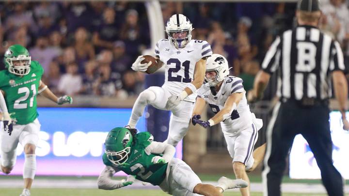 Kansas State Wildcats wide receiver Bryce Noernberg (21) avoids a tackle during the second half against the North Dakota Fighting Hawks at Bill Snyder Family Stadium on Aug. 30, 2025.