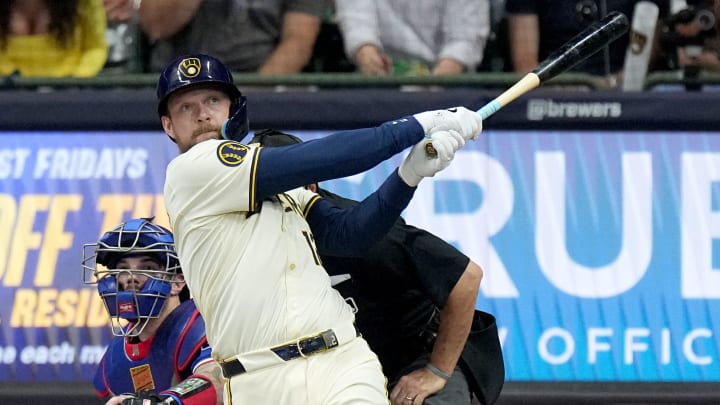 Milwaukee Brewers first baseman Rhys Hoskins (12) hits a grand slam home run