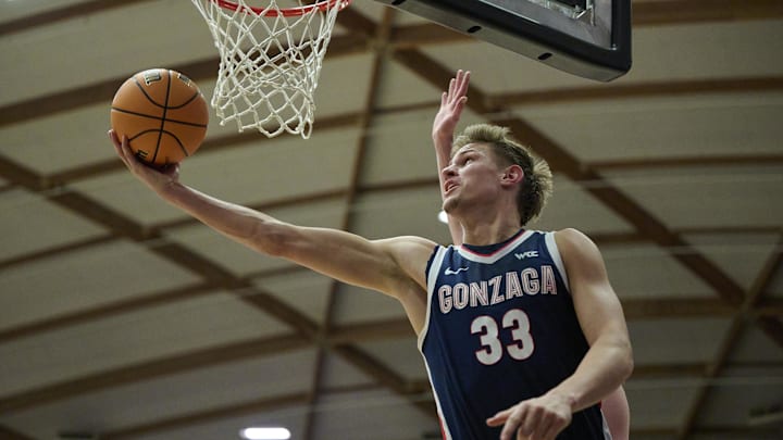 Gonzaga Bulldogs forward Ben Gregg (33) scores a basket during the second half against the Portland Pilots. Gonzaga Bulldogs forward Ben Gregg (33) scores a basket during the second half against the Portland Pilots.