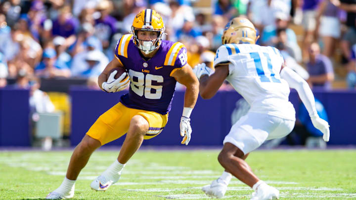 Tigers tight end Mason Taylor 86 runs the ball after the catch as the LSU Tigers take on UCLA at Tiger Stadium in Baton Rouge, LA. Saturday, Sept. 21, 2024. Tigers tight end Mason Taylor 86 runs the ball after the catch as the LSU Tigers take on UCLA at Tiger Stadium in Baton Rouge, LA. Saturday, Sept. 21, 2024.