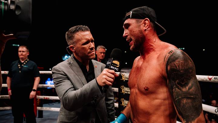 Darren Till (right) speaking to BKFC ring-side announcer Cyrus Fees (left) after his debut win over Aaron Chalmers at BKFC 90.