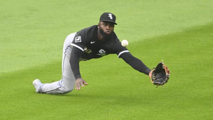 Jul 3, 2024; Cleveland, Ohio, USA; Chicago White Sox center fielder Luis Robert Jr. (88) makes a catch in the third inning against the Cleveland Guardians at Progressive Field.