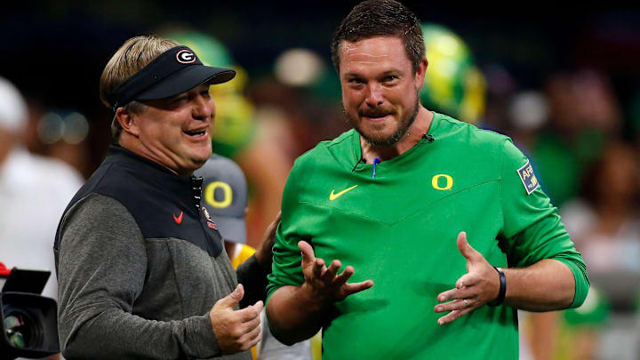 Georgia head coach Kirby Smart and Oregon head coach Dan Lanning meet during warm ups before the start of the Chick-fil-A Kickoff NCAA college football game between Oregon and Georgia in Atlanta, on Saturday, Sept. 3, 2022.

News Joshua L Jones