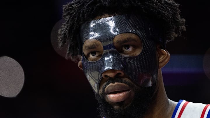 Dec 23, 2024; Philadelphia, Pennsylvania, USA; Philadelphia 76ers center Joel Embiid (21) looks on during the second quarter against the San Antonio Spurs at Wells Fargo Center. Mandatory Credit: Bill Streicher-Imagn Images