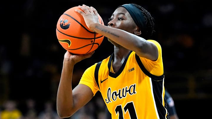 Iowa guard Chit-Chat Wright (11) shoots the basketball against the Ohio State Buckeyes Jan. 25, 2026 at Carver-Hawkeye Arena in Iowa City, Iowa.