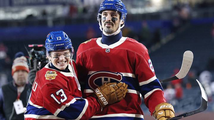 Oct 25, 2026; Winnipeg, Manitoba, CAN;  Montreal Canadiens right wing Cole Caufield (13)  and Montreal Canadiens left wing Chris Kreider (22) celebrate their victory over the Winnipeg Jets during the 2026 Heritage Classic ice hockey game at Princess Auto Stadium.  Mandatory Credit: James Carey Lauder-Imagn Images