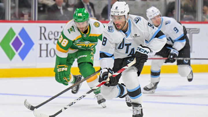 Oct 25, 2025; Saint Paul, Minnesota, USA; Utah Mammoth forward Nick Schmaltz (8) controls the puck as Minnesota Wild forward Ryan Hartman (38) gives chase during the third period at Grand Casino Arena. Mandatory Credit: Nick Wosika-Imagn Images Oct 25, 2025; Saint Paul, Minnesota, USA; Utah Mammoth forward Nick Schmaltz (8) controls the puck as Minnesota Wild forward Ryan Hartman (38) gives chase during the third period at Grand Casino Arena. Mandatory Credit: Nick Wosika-Imagn Images