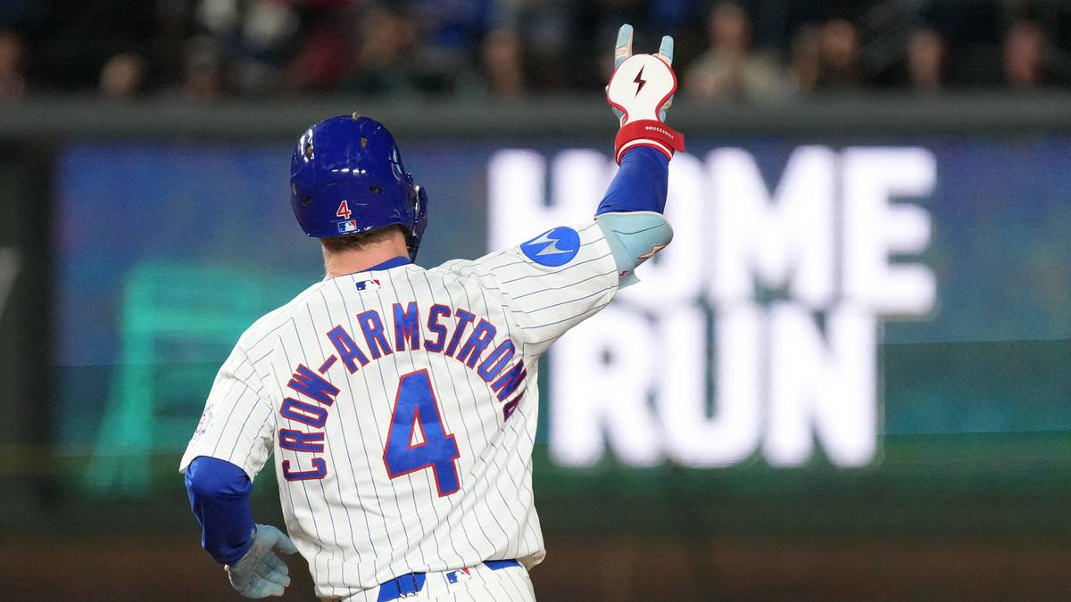 Pete Crow-Armstrong gestures after hitting his 42nd home run against the Atlanta Braves at Wrigley Field
