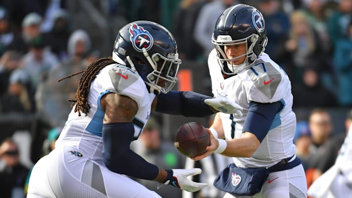 Tennessee Titans quarterback Ryan Tannehill (17) hands to Derrick Henry (22)