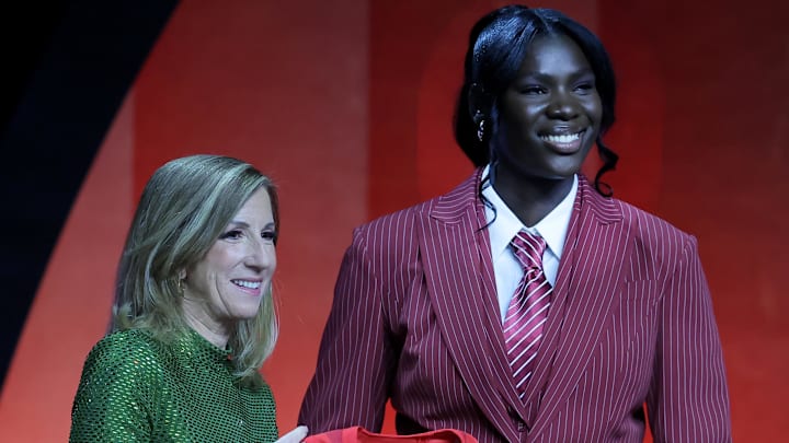 Apr 13, 2026; New York, NY, USA;  WNBA Commissioner Cathy Engelbert (left) poses for photos with Madina Okot who was selected thirteenth overall by the Atlanta Dream during the 2026 WNBA Draft at The Shed at Hudson Yards. Mandatory Credit: Brad Penner-Imagn Images